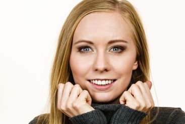 Smiling girl in warm season clothing