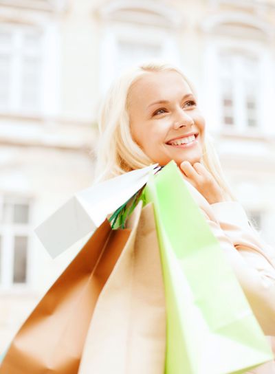 woman with shopping bags in ctiy