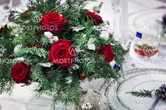 Bunch of roses with chrismas-tree decorations