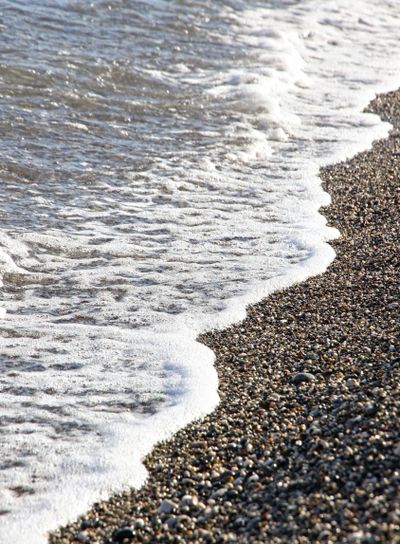 Pebble beach at the Mediterranean seacoast