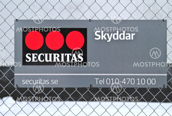 Securitas sign on fence 1