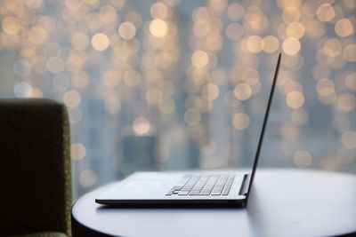close up of laptop computer on table at christmas