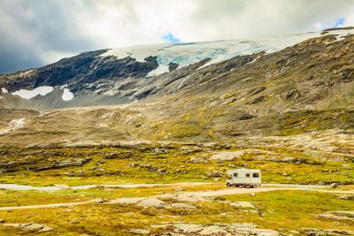 Camper car in norwegian mountains