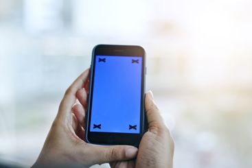 Closeup, hand and phone with green screen for social...