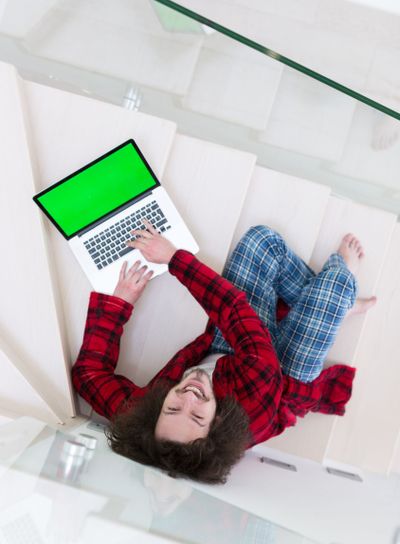 freelancer in bathrobe working from home