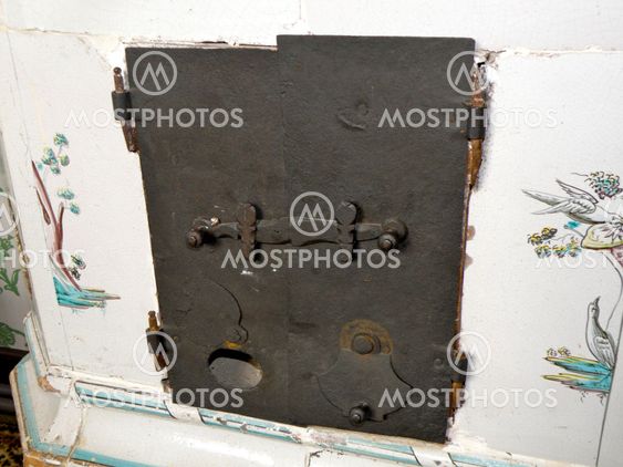 Oven door to the old fireplace.