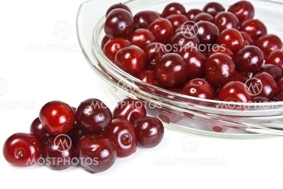 cherries on a glass dish