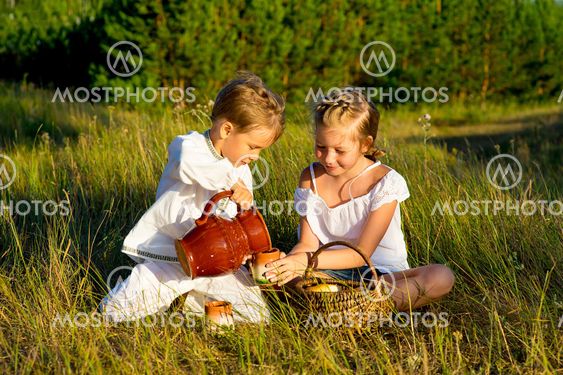 brother and sister on picnic