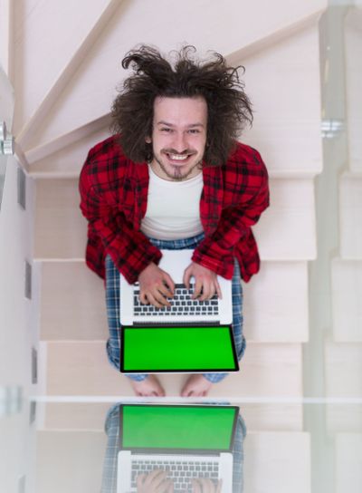 freelancer in bathrobe working from home