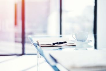 Notebook, meeting and empty room of boardroom in office...