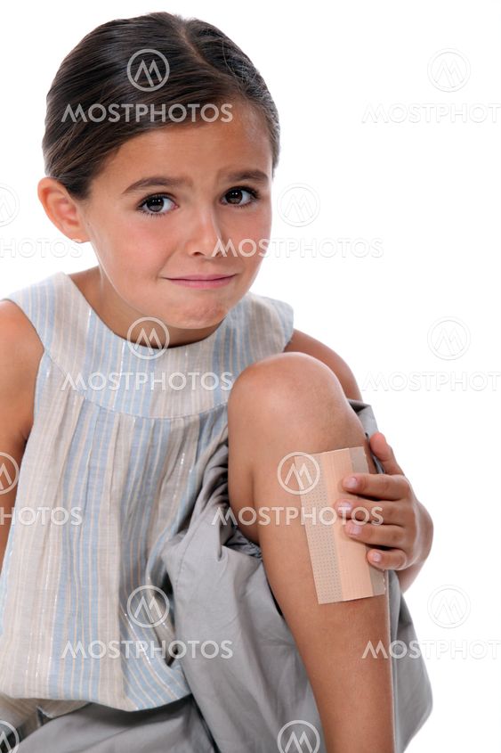 Young girl with an enormous plaster on her leg