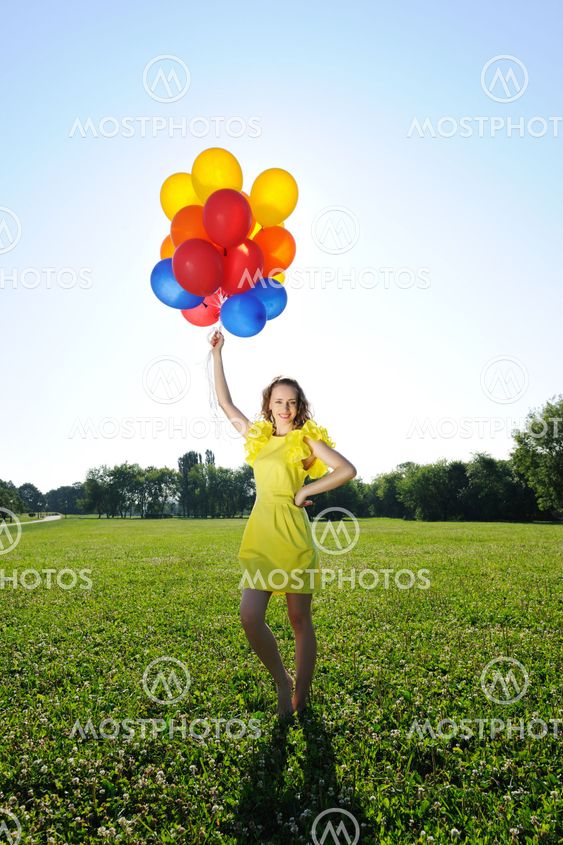 Kvinna med ballonger