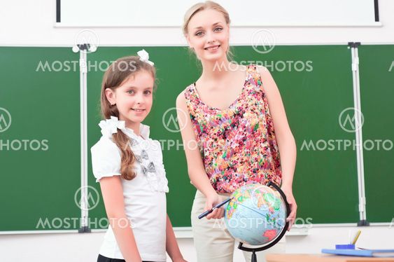 teacher explains the lesson in geography