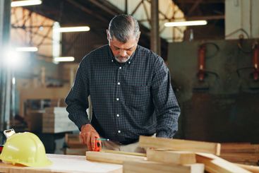 Industry, measuring tape and wood with carpenter man in...