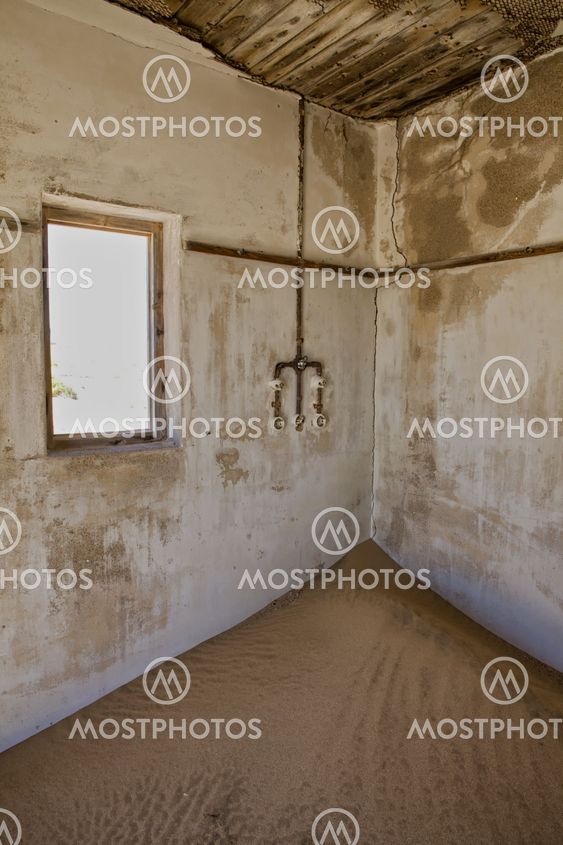 an house full of sand in kolmanskop namibia africa