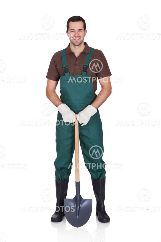 Happy young gardener in dungarees