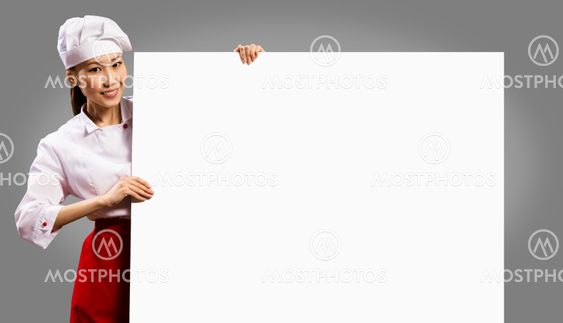 female chef holding a poster for text