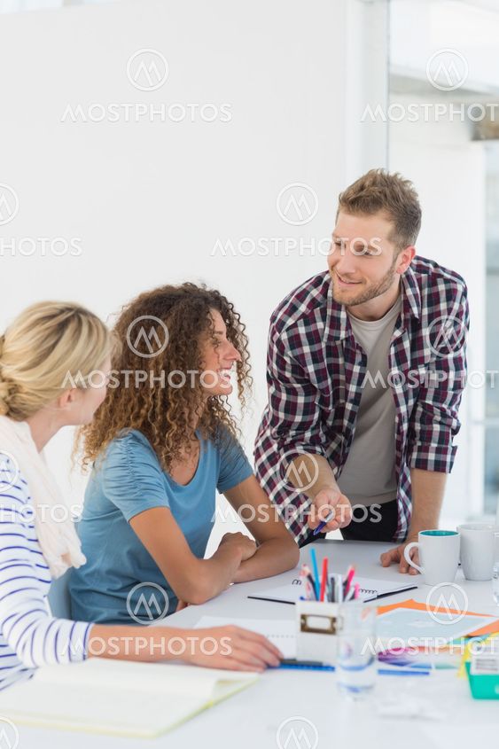 Young happy design team having a meeting together