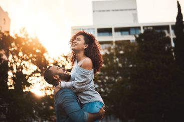 Lift, happy and couple in morning for fun, playful...