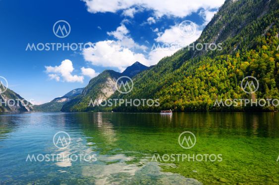 Stunning deep green waters of Konigssee, known as...