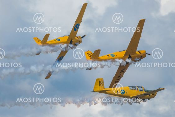 Group of yellow SK 50 in formations in the airshow at...