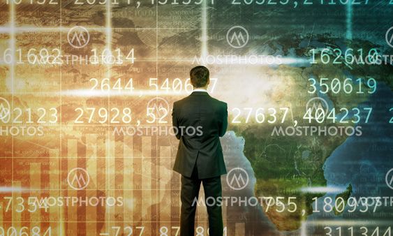 Businessman in front of holographic screen