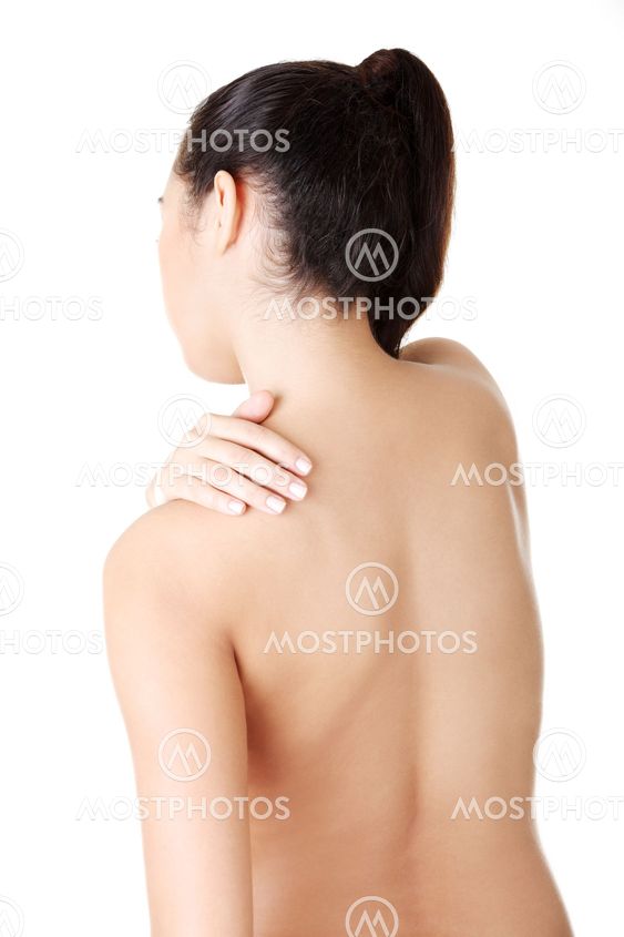 Young woman with pain in her back
