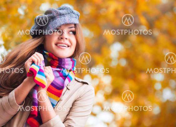 Young woman in autumn park