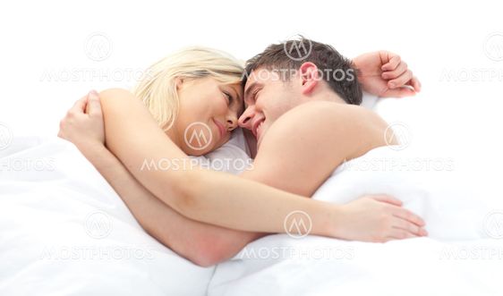 loving Couple relaxing on bed
