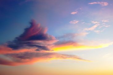 the evening sky after sunset showcases a mesmerizing...