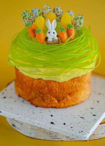 Easter Cake Decoration with Bunny and Carrots. baked...