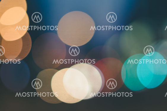 Abstract background of colorful bokeh lights with defocused effect