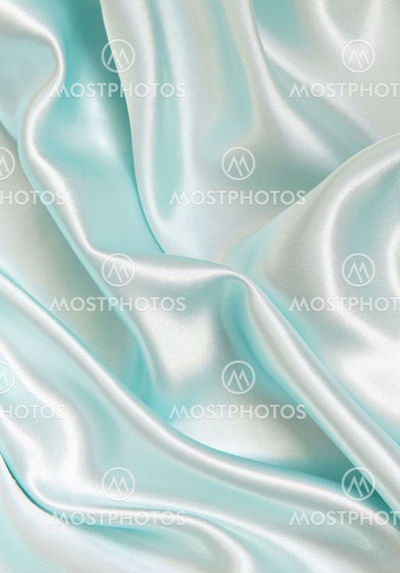 Smooth elegant blue silk as background