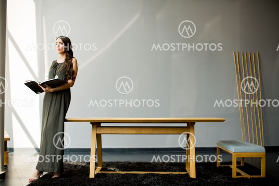 Pretty young woman in the room