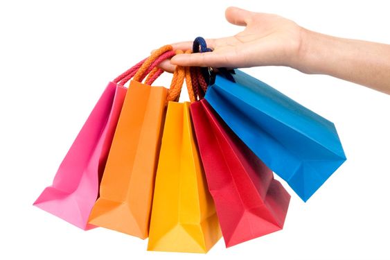 färggranna påsar av papper för shopping