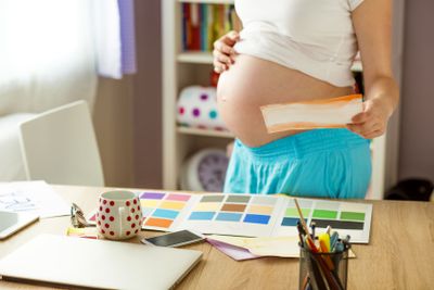 Pregnant woman working from home