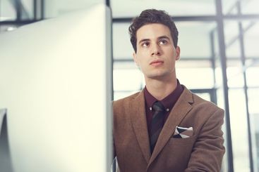 Thinking, computer and idea with business man in office...