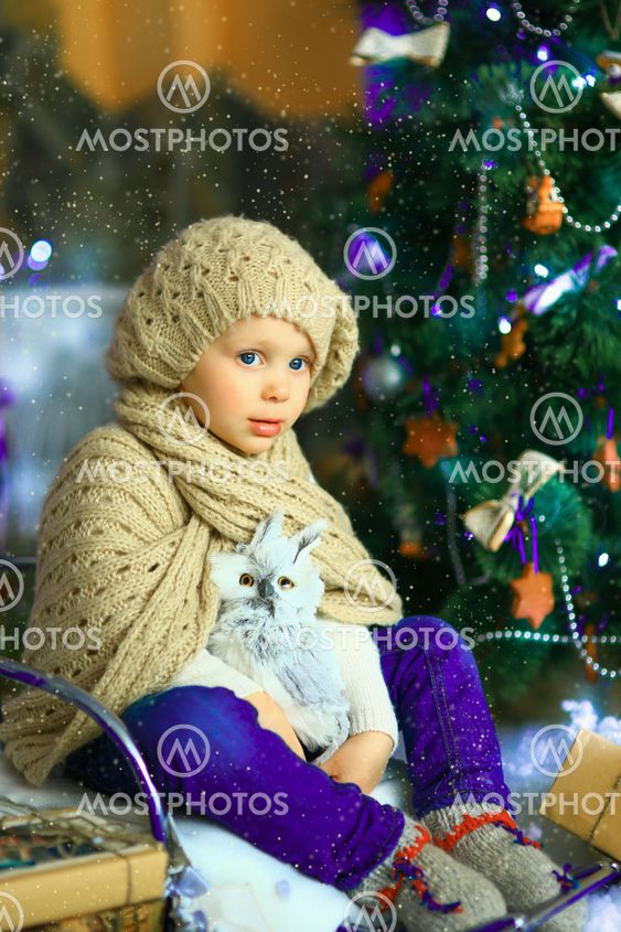 the girl near a Christmas fir-tree 6