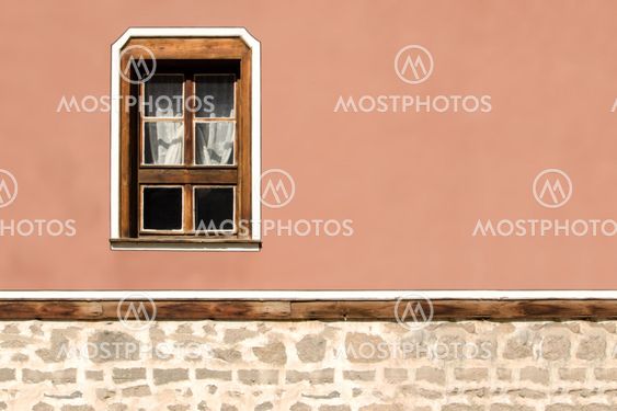 Horizontal part of the facade of the old building in...
