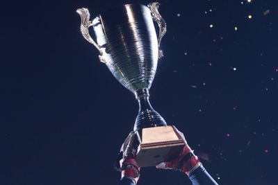 american football team celebrating victory