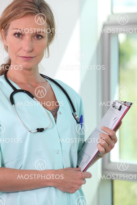 Female doctor with stethoscope and clipboard
