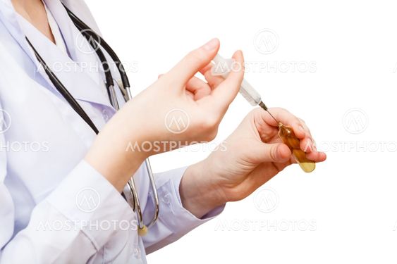 nurse fills syringe from ampoule isolated