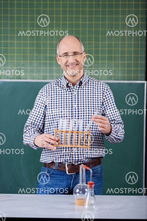 Science teacher conducting an experiment