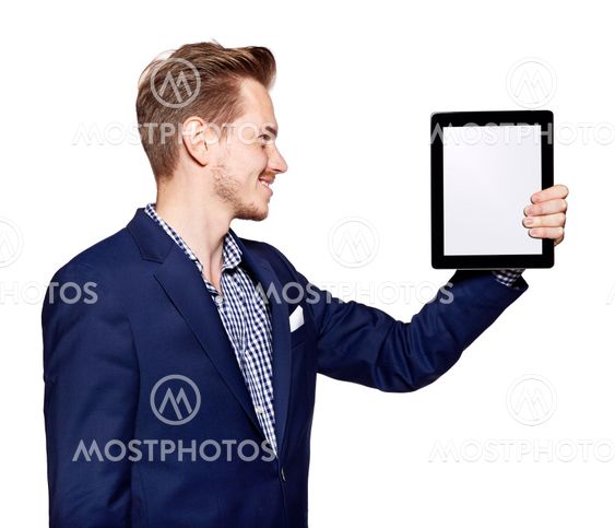 Young man is looking at digital tablet