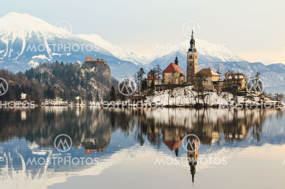 Amazing sunrise at the lake Bled in winter