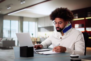 Photo Title: Young Black Man Working From Home