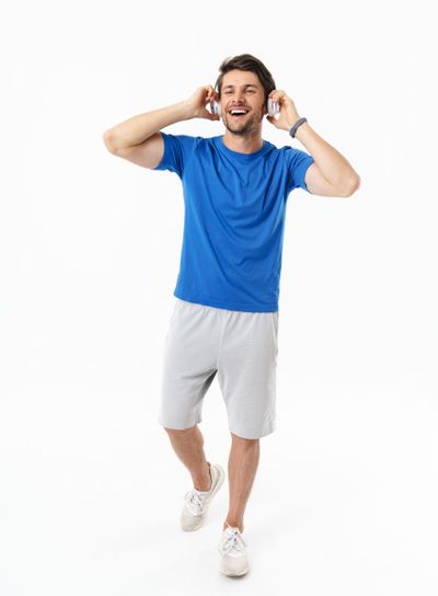 Full length photo of brunette man in casual t-shirt...