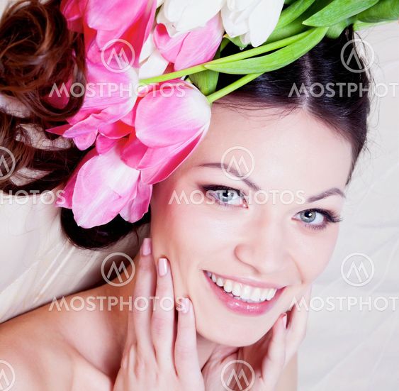 Girl with tulip flowers