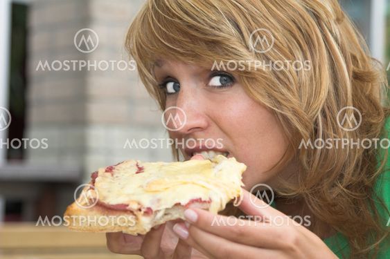 Enjoying her toast