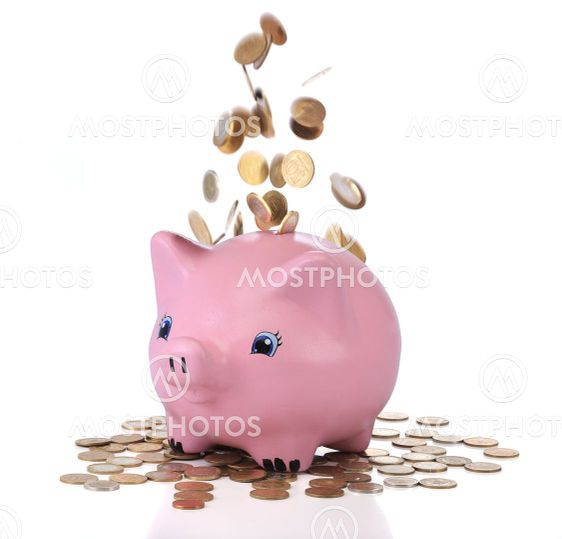 Piggy bank with falling coins
